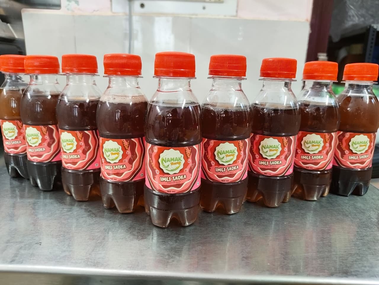 A retail-ready lineup of Namak Theory Imli Tadka bottles